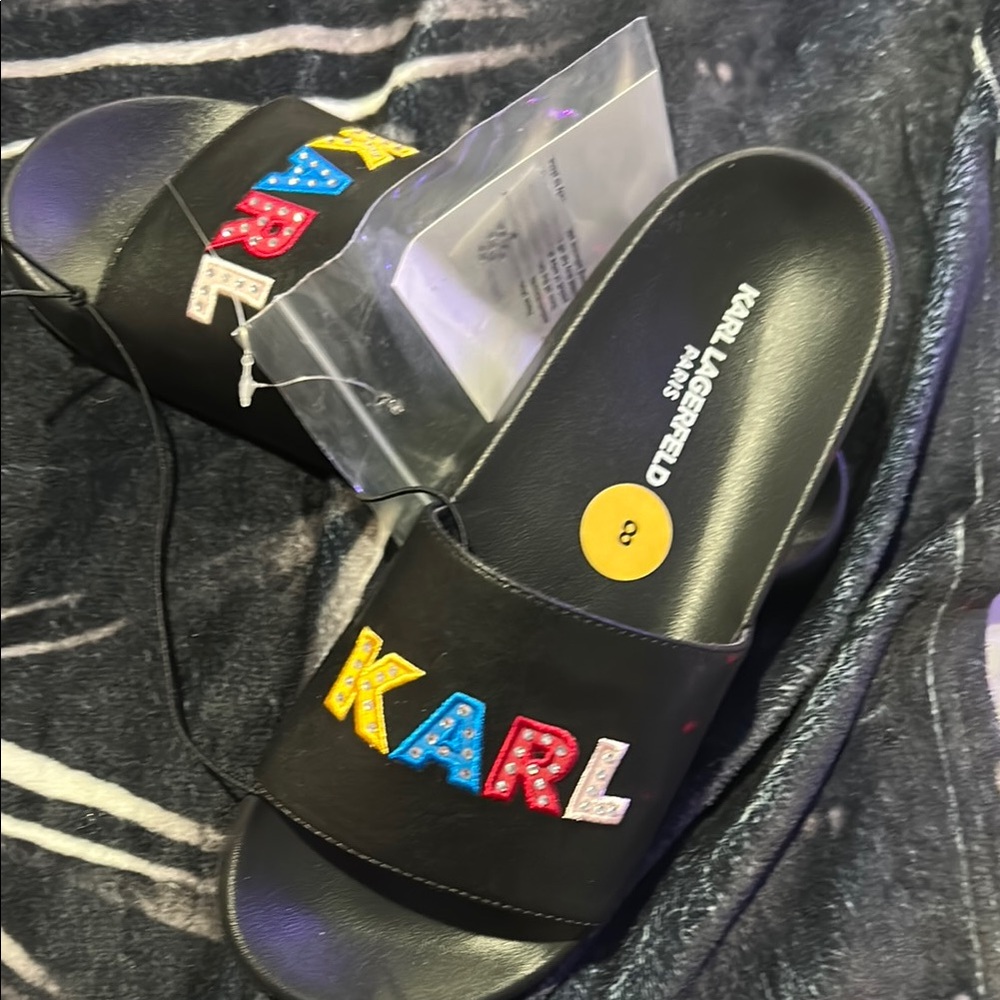 Karl Lagerfeld Black Slides Sz8 No longer has tags or rhinestones gently used